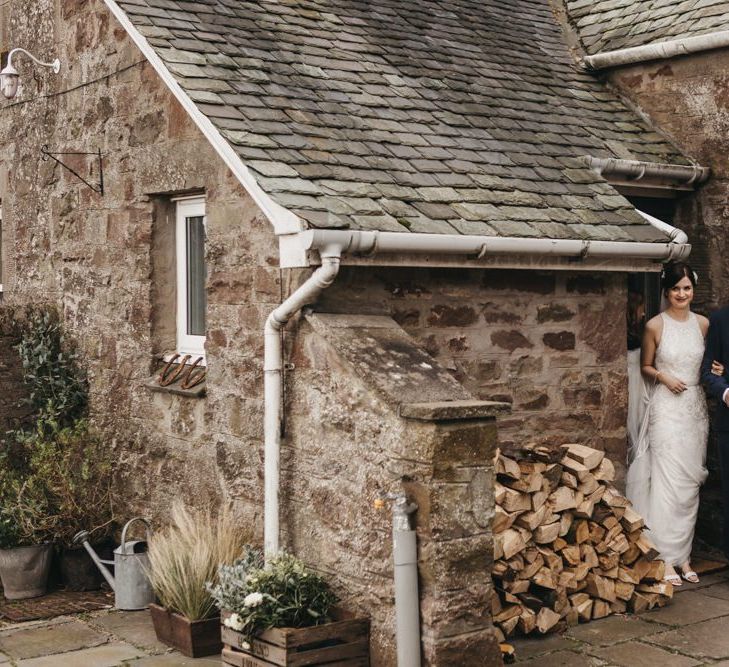 Bride makes her way to ceremony at Guardswell Farm