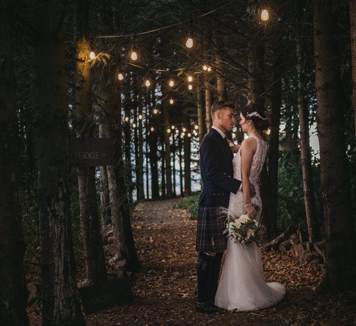 Woodland portrait of bride and groom