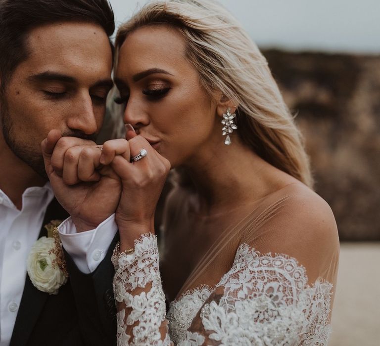 Bride and groom holding hands at California elopement