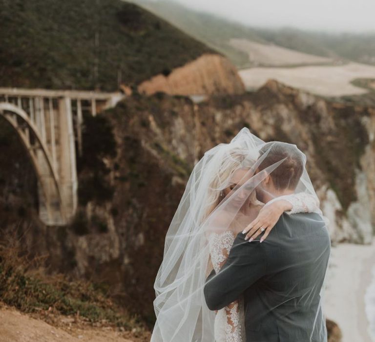 bride and groom portrait on a California hill