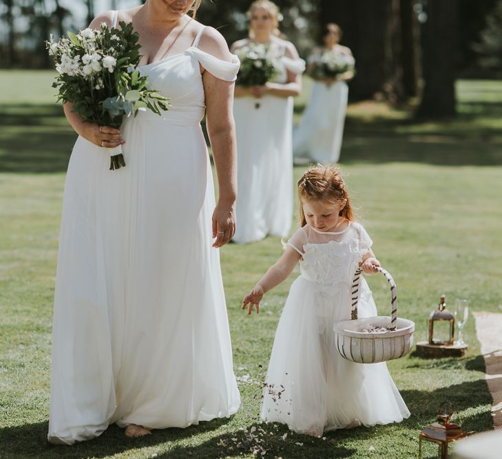 Bridesmaids And Flower Girls In White Dresses // Blush Pink Wedding Dress For Outdoor Wedding Ceremony At Hethfelton House With Images From Dorset Wedding Photographer Paul Underhill