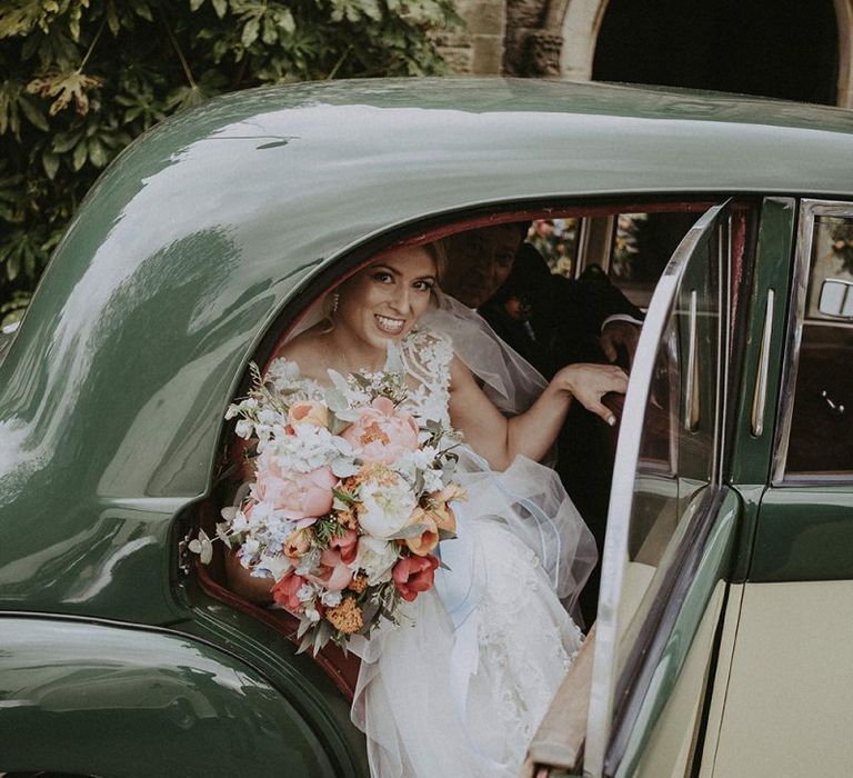 Bridal Party Arrival in Vintage Wedding Car