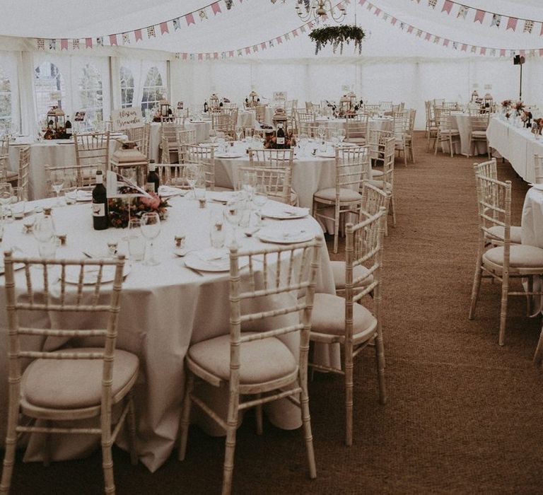 Marquee Wedding Reception with Greenery Chandelier and DIY Bunting