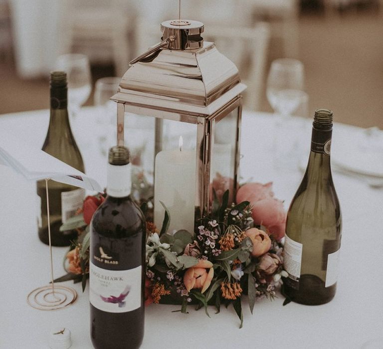 Lantern Wedding Centrepiece Surrounded by Spring Flowers