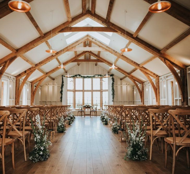 Rustic barn wedding ceremony at Hyde House