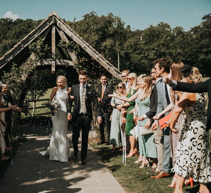 Confetti exit for bride and groom at Hyde House