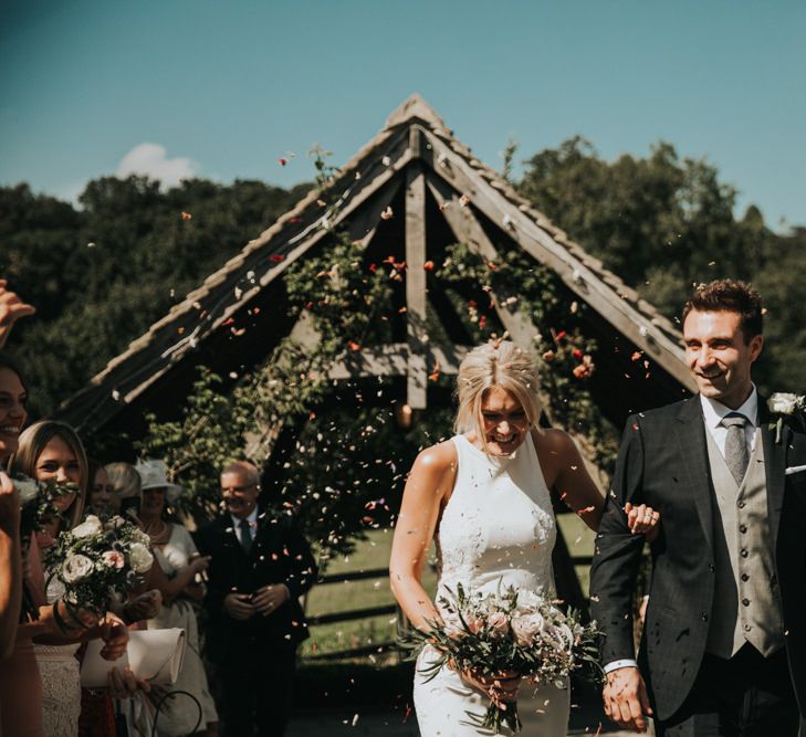 Confetti exit for bride and groom at Hyde House