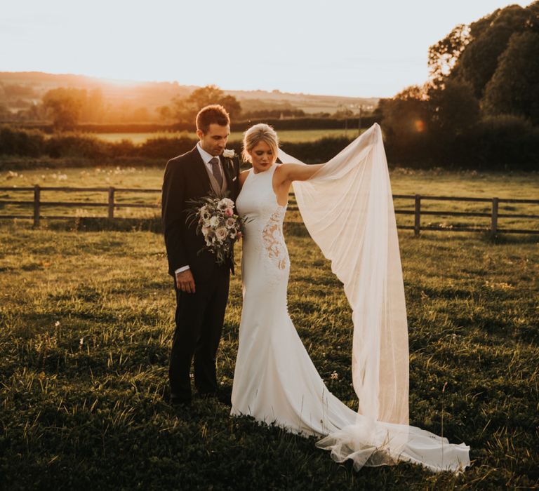 Bride in lace panel wedding dress