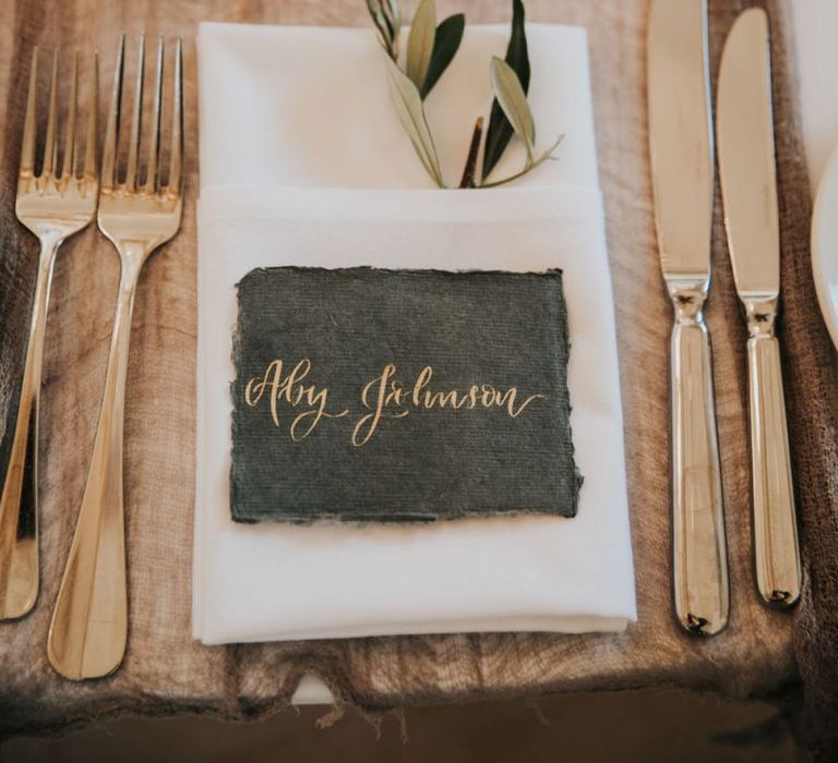 Wedding place setting at rustic barn wedding