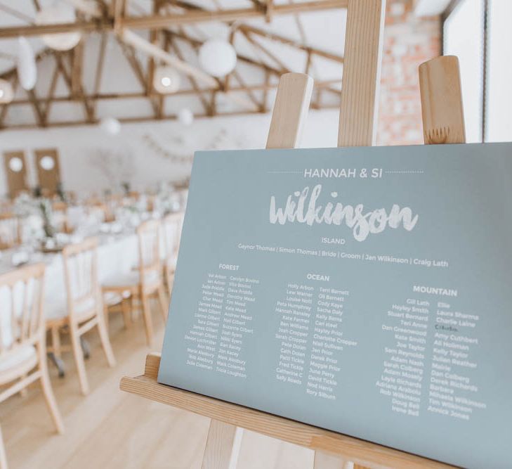 Contemporary Table Plan on Easel in Barn Reception