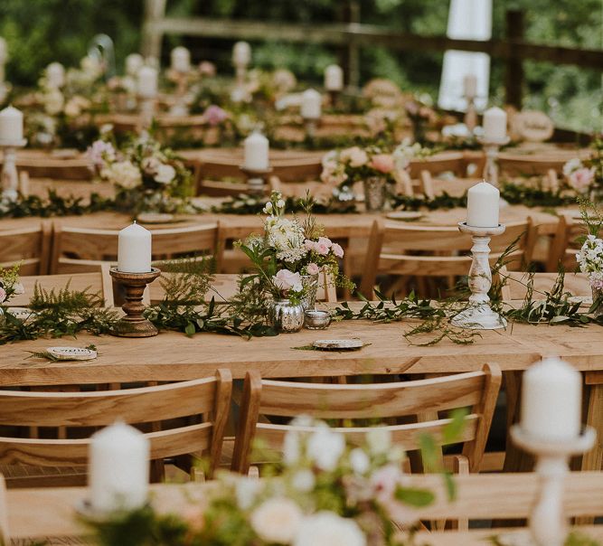 Wooden Tables with Candles and Flower Decor