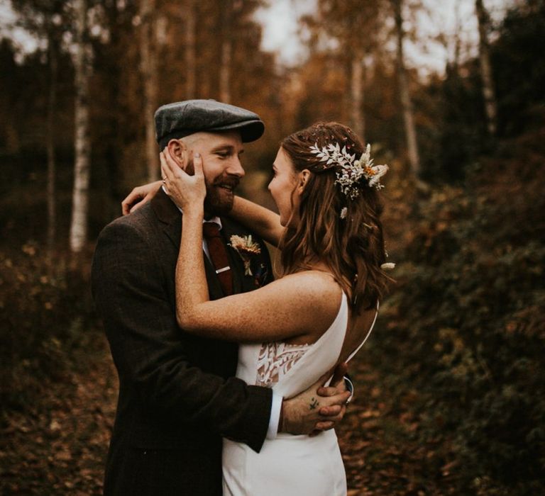 Bride and groom at woodland wedding