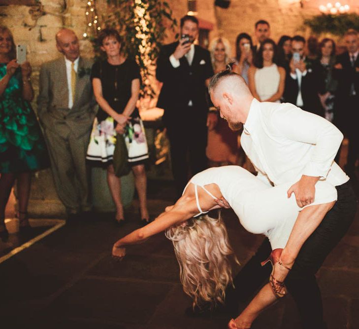 Bride and Groom Dancing Their Choreographed First Dance