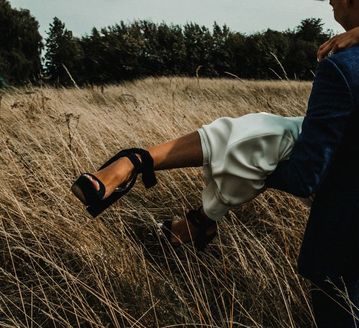 Something Blue Shoes // Bride In The Row For Bohemian Wedding In The Cotswolds With PapaKata Tipi And Ceremony At Merriscourt With Images From Carla Blain Photography