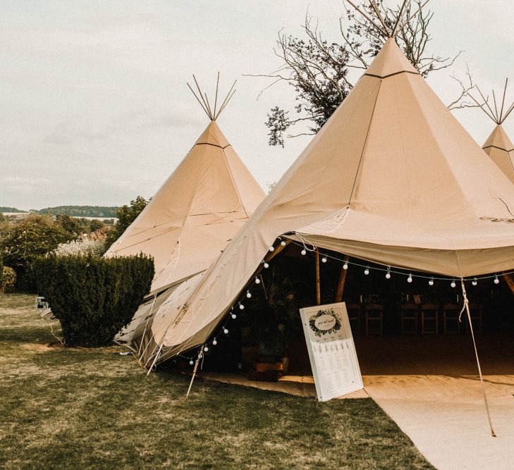 PapaKata Tipi For Wedding // Bride In The Row For Bohemian Wedding In The Cotswolds With PapaKata Tipi And Ceremony At Merriscourt With Images From Carla Blain Photography