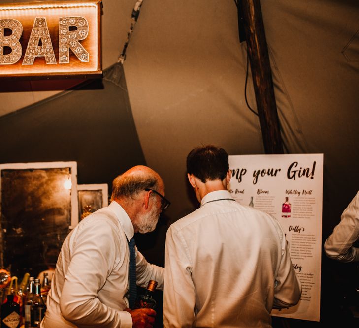 Gin Bar For Wedding // Bride In The Row For Bohemian Wedding In The Cotswolds With PapaKata Tipi And Ceremony At Merriscourt With Images From Carla Blain Photography