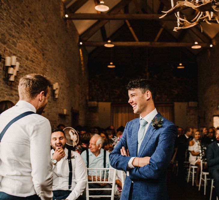 Groom In Cad And The Dandy Suit // Bride In The Row For Bohemian Wedding In The Cotswolds With PapaKata Tipi And Ceremony At Merriscourt With Images From Carla Blain Photography