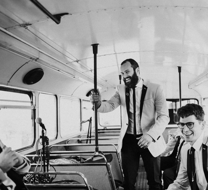 Groomsmen on London Double Decker Bus