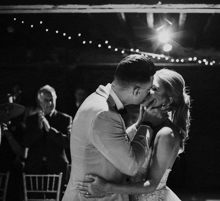 Bride and Groom Kissing During the Wedding Ceremony