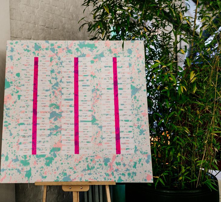 Colourful Wedding Seating Chart on Easel