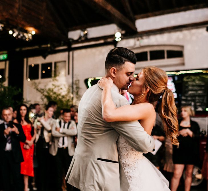 Bride and Groom Taking Their First Dance