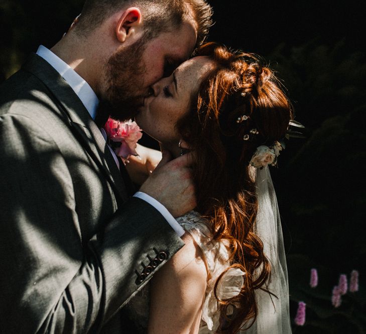 Bride in  Appliqué Flowers Yolan Cris ‘Espino’ Wedding Dress | Groom in Grey's Suit Hire | Pre-Raphaelite Mood Wedding at Heaver Castle in Kent | Carla Blain Photography