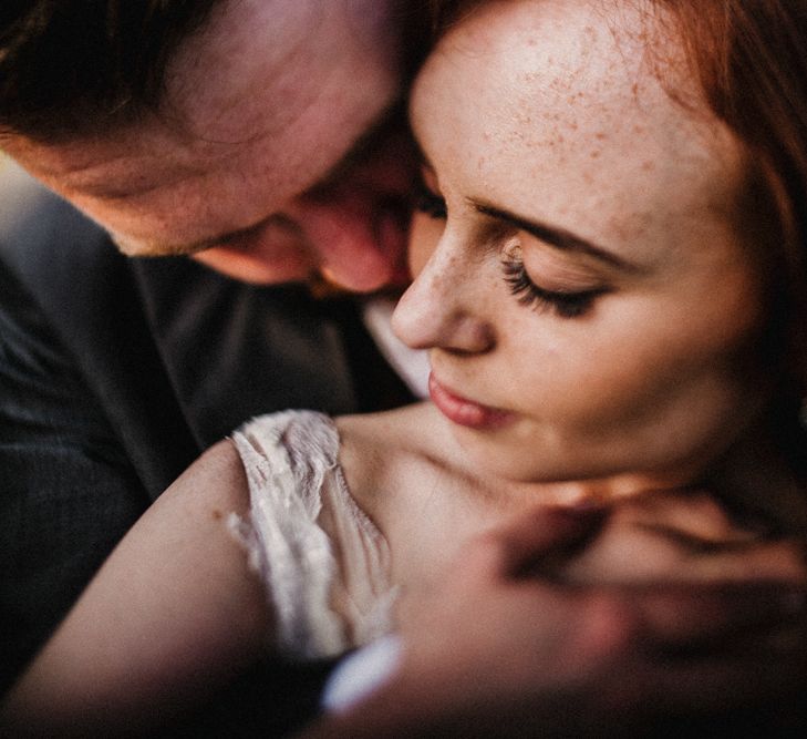 Bride in  Appliqué Flowers Yolan Cris ‘Espino’ Wedding Dress | Groom in Grey's Suit Hire | Pre-Raphaelite Mood Wedding at Heaver Castle in Kent | Carla Blain Photography