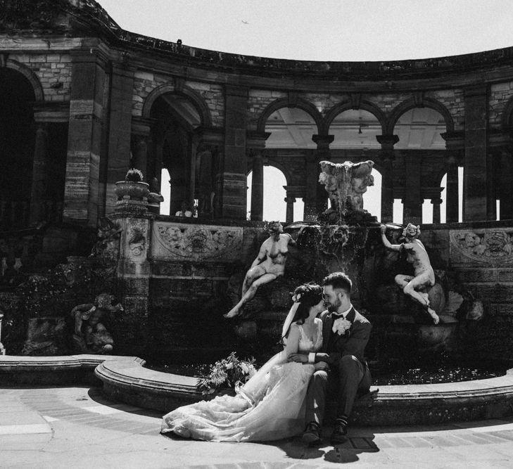 Bride in  Appliqué Flowers Yolan Cris ‘Espino’ Wedding Dress | Groom in Grey's Suit Hire | Pre-Raphaelite Mood Wedding at Heaver Castle in Kent | Carla Blain Photography