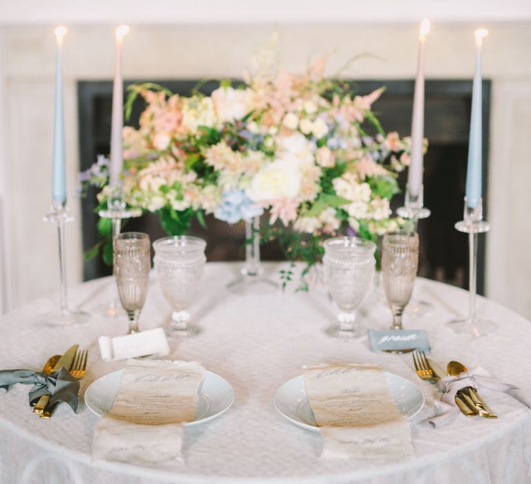 Blue table setting with gold cutlery | Bespoke Planning and Styling by Helaina Storey Wedding Design | Image by Nastja Kovacec