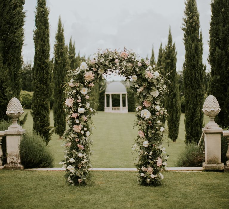 Floral arch installation | Bespoke Planning and Styling by Helaina Storey Wedding Design | Image by Aubree Lynn Photography