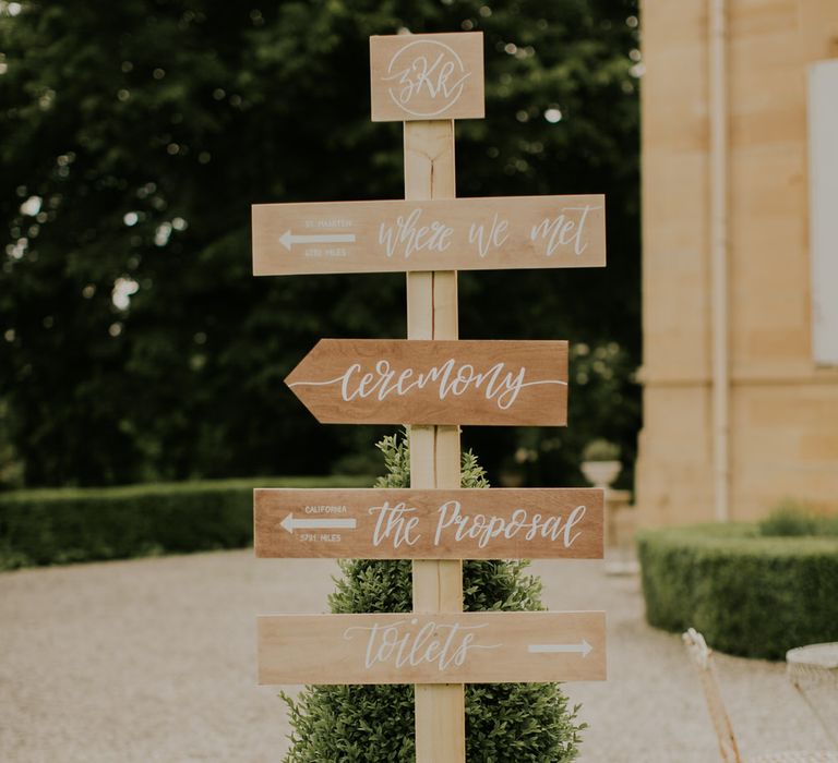 Hand painted wooden wedding signage | Bespoke Planning and Styling by Helaina Storey Wedding Design | Image by Aubree Lynn Photography