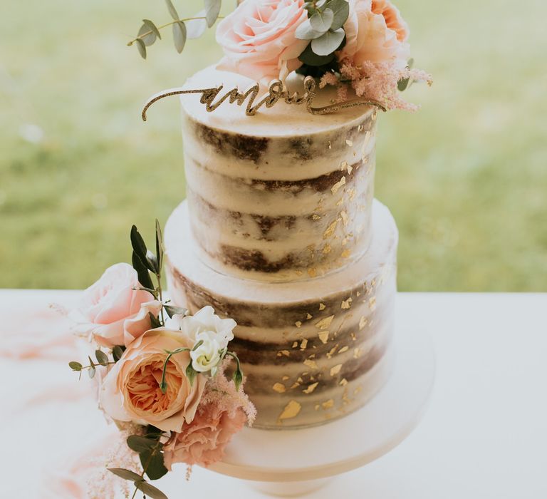 Semi naked wedding cake with flowers and gold leaf details | Bespoke Planning and Styling by Helaina Storey Wedding Design | Image by Aubree Lynn Photography