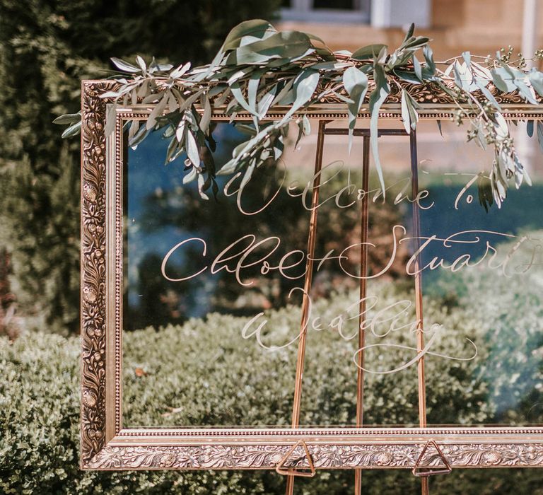 Calligraphy on mirror with antique frame | Bespoke Planning and Styling by Helaina Storey Wedding Design | Image by Alice Cunliffe Photography