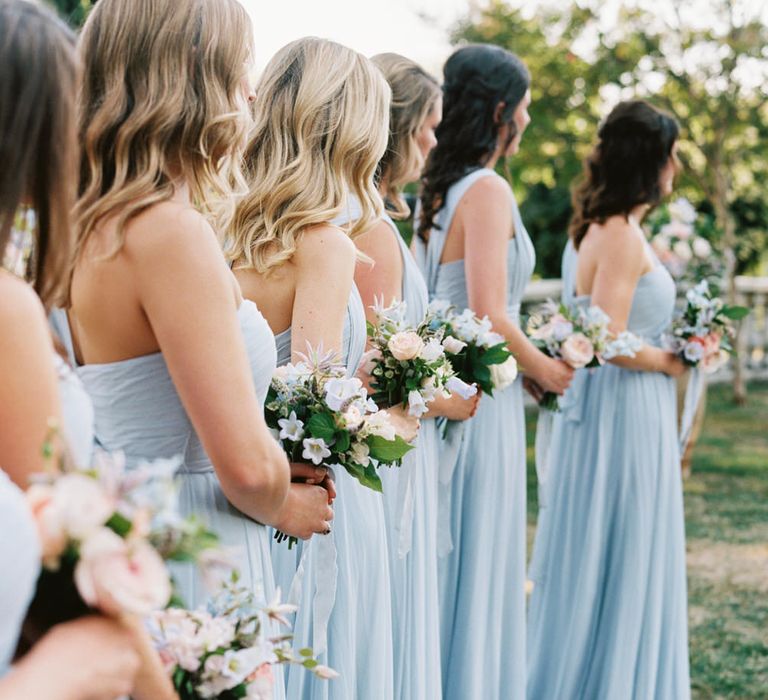 Pale blue bridedmaid gowns | Bespoke Planning and Styling by Helaina Storey Wedding Design | Image by Taylor &amp; Porter