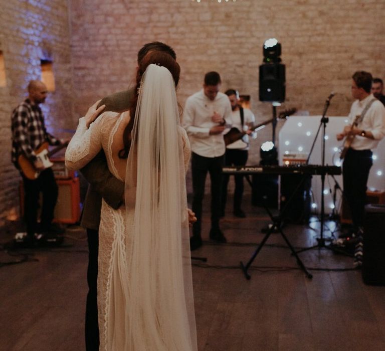 First dance at Lapstone Barn with cathedral length veil