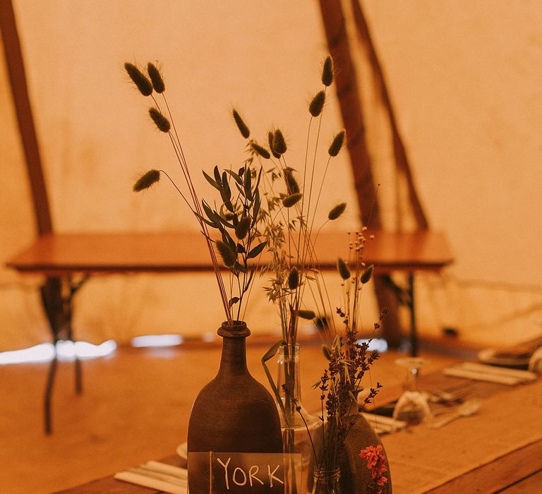 Dried Flower Stems in Bottles | Wedding Decor | Rustic Barn &amp; Tipi Wedding at High House Farm Brewery, Northumberland | Maureen du Preez Photography