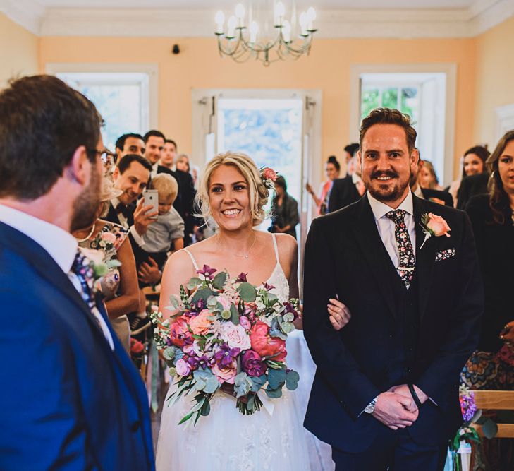 Bridal Entrance in MiaMia Spagetti Strap Bridal Gown | DIY Bright Family Wedding at Plas Glansevin in Carmarthenshire, Wales |  O&amp; C Photography