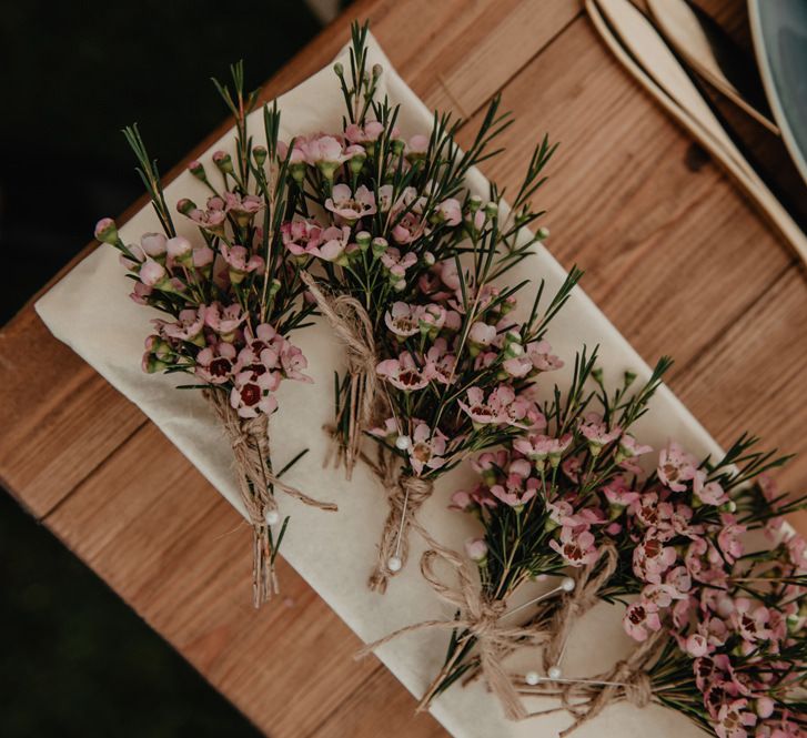 Buttonholes for wedding with Prosecco wall