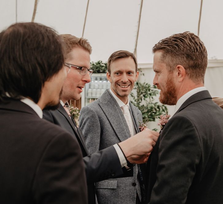 Groom preparations with groomsmen