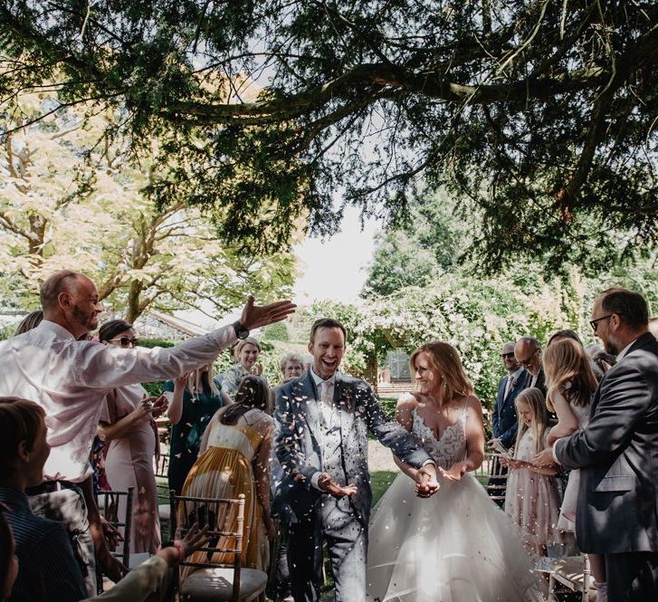 Confetti exit for bride and groom