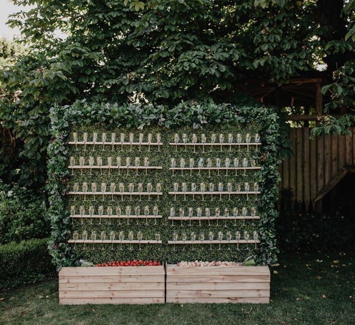 Prosecco wall at outdoor wedding