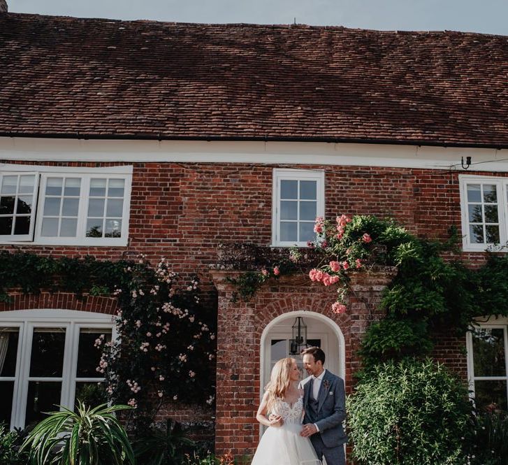 Garden wedding at brides home with Prosecco wall