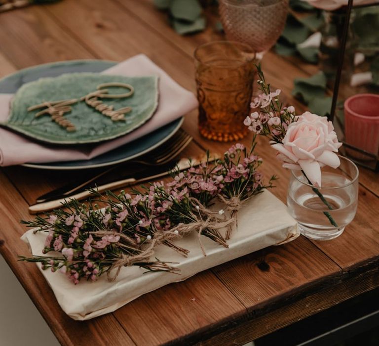 Lasercut wooden place names and favours at marquee wedding