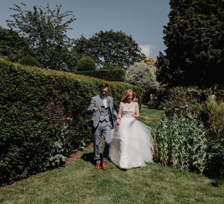 Bride wears Hayley Paige wedding dress with tulle skirt