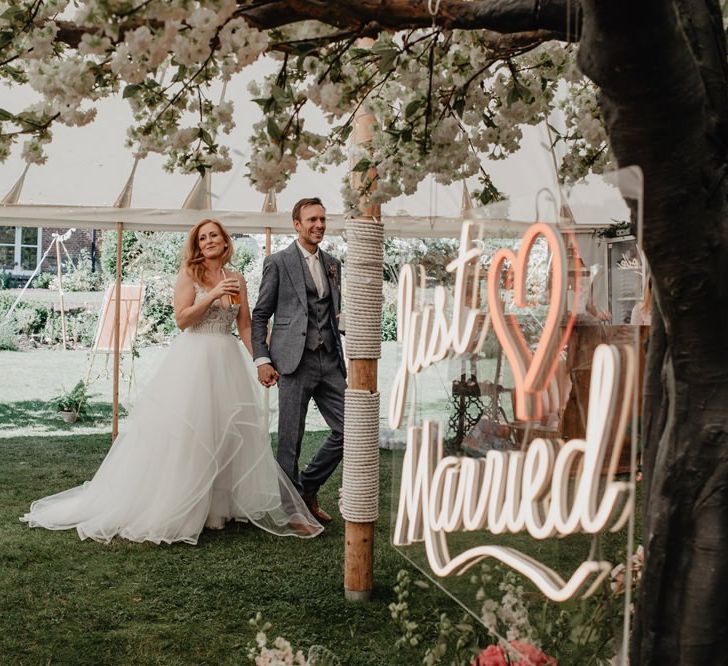 Just married neon wedding sign and Prosecco wall