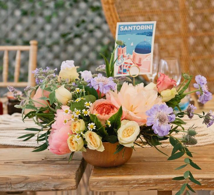 Colourful Wildflower Wedding Centrepiece with Postcard Table Name