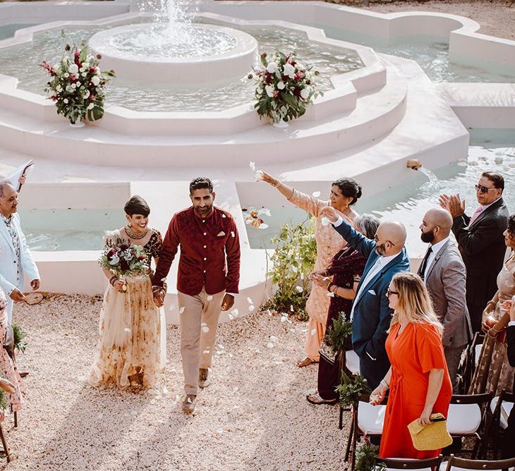 Burgundy and gold Indian wedding dress