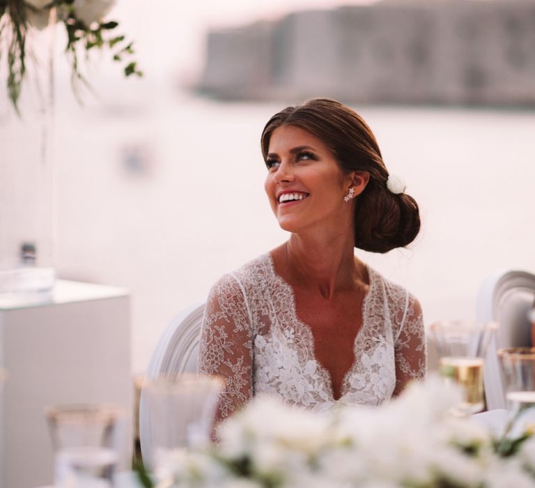 Beautiful Bride Smiling During Wedding Speeches