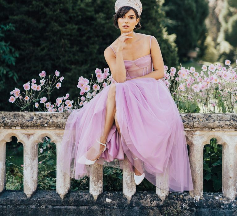 Stylish Bride in Lilac Emma Beaumont Wedding Dress and Hermione Harbutt Headdress