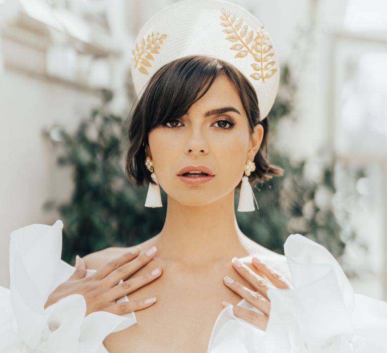 Bride with Short Bob Hair Wearing an Embroidered Headdress and Tassel Earrings